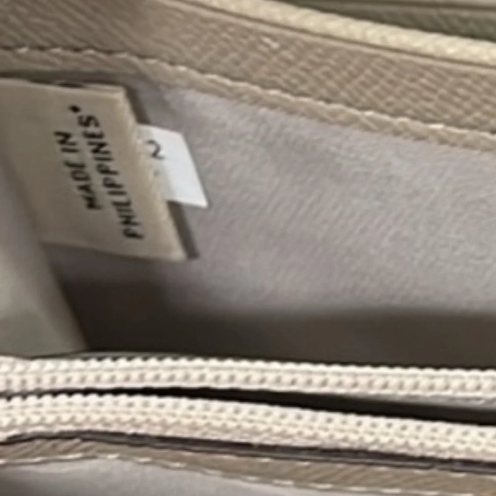 Coach leather pull detailing